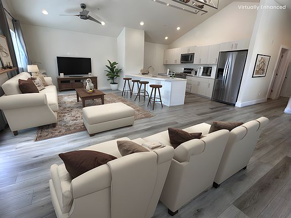 Upper living/kitchen vertually staged