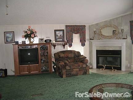 Other side of great room with fireplace