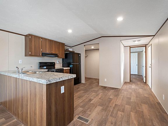 5th image of 703 Sun Land Cir