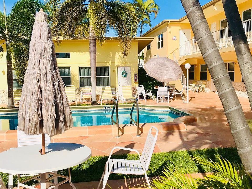 pool area with tables and chairs