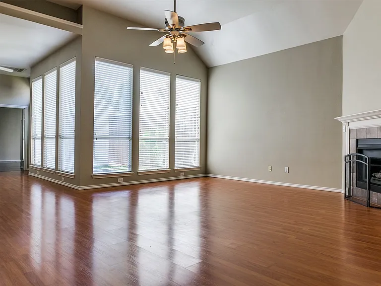 Wall of windows in living room & dining area.