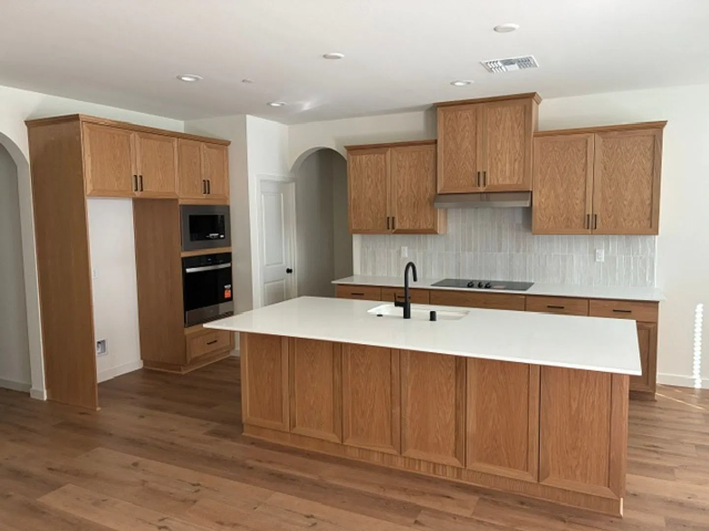 Brand New 4 Bedroom Home with Paid Solar, 3-Car Garage & Large Backyard — Photo 4