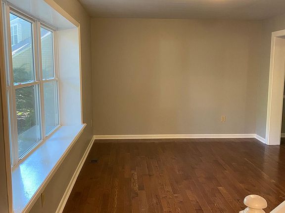 Large living room with lots of natural light.