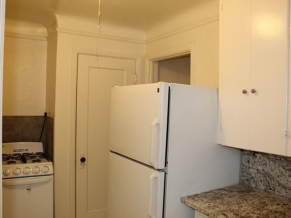 Part of kitchen and closet #2 entrance.