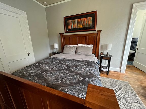 Restoration Hardware queen bed and linens.