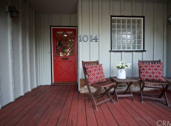Original Redwood siding and front door.