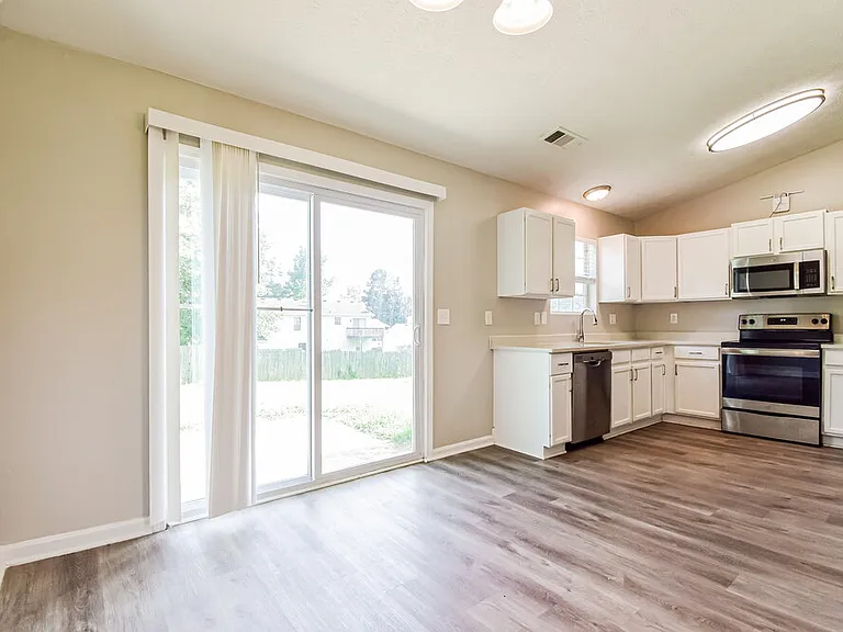 6149 Raleigh Oaks Ct — Photo 5