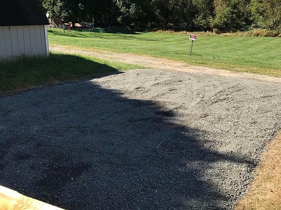 Parking area behind the house