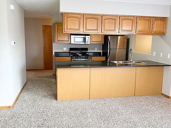 Dining area to kitchen, hall