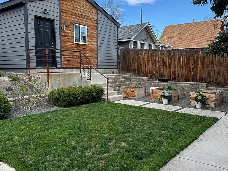 Rear grassy area with Garage #1