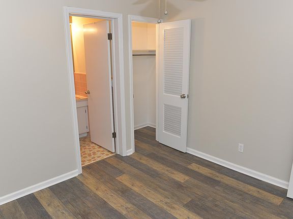 Bedroom looking towards bathroom and closet