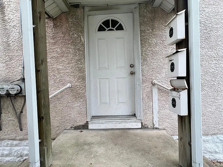 Side entrance door to apartment