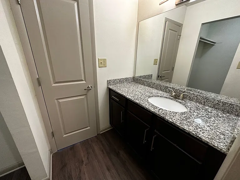 Bathroom featuring granite countertops