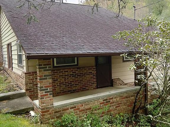 porch facing lower carport