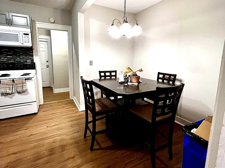 Eat in Kitchen, complete with refrigerator, microwave, stove, & oven
