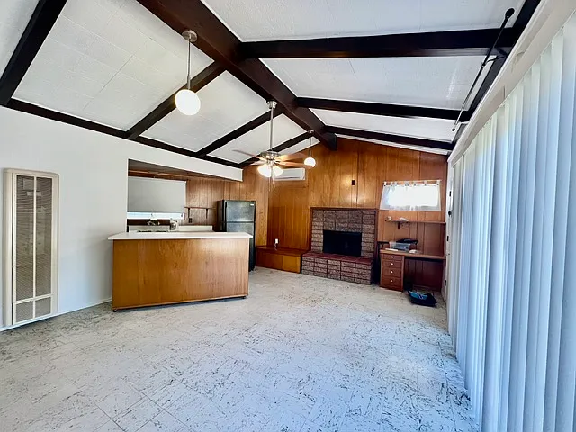 Fireplace, desk (built in) dining bar/area & kitchen