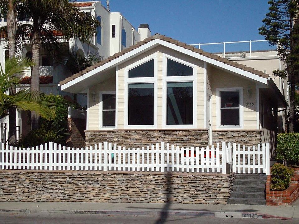 Front of House with Patio. Ocean view deck in right upper corner of photo