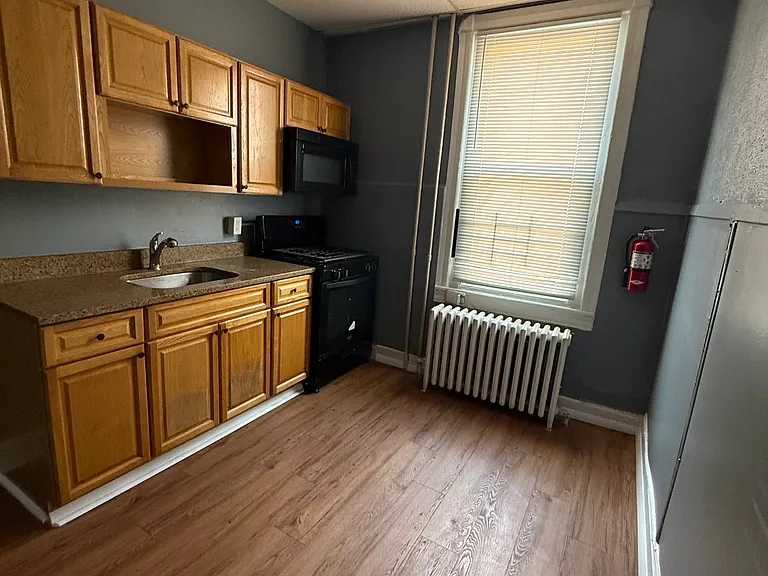 5731 Woodland Ave #1R — Photo 8