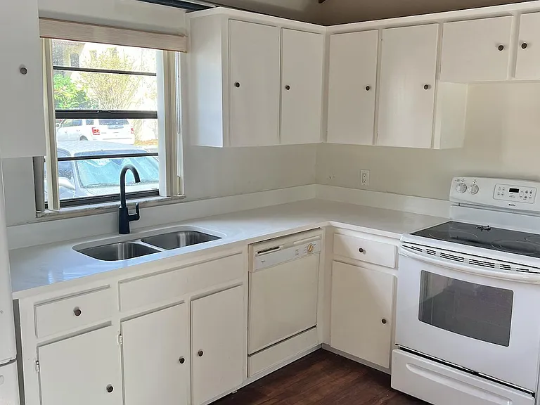 new flooring and countertops, as well as updated fixture and plumbing.