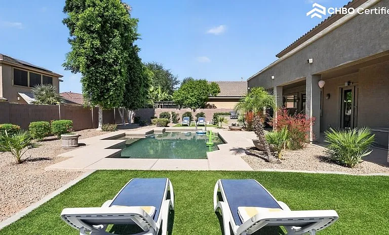 Large backyard to relax and rewind with a heated pool.