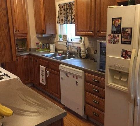 kitchen with maple cabinets, fully equipped.
