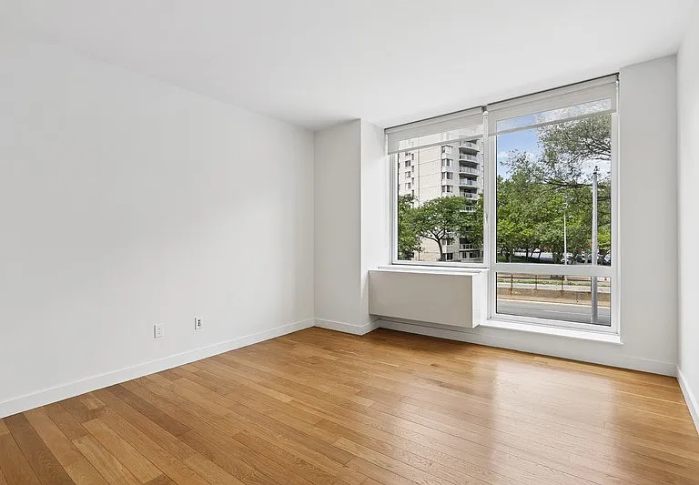 Step into the bright and airy living space at Arbor, featuring large windows that invite ample natural light and stunning views. Enjoy the perfect blend of comfort and style. Schedule your tour today and envision your new home!
