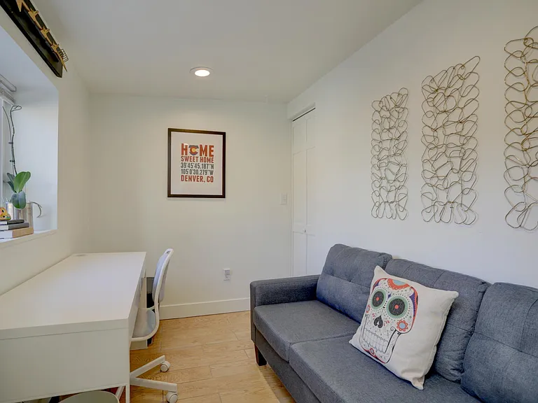 Office with desk and couch