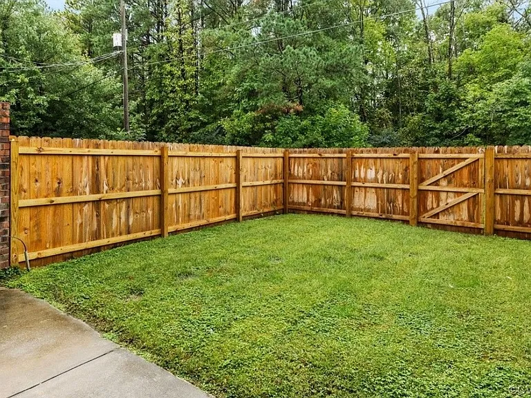 Private/fully fenced backyard with patio set for al fresco dining