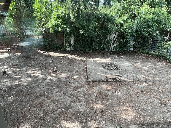 back yard fire pit fully fenced