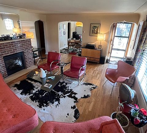 Living Room & view of Entry and Dining Room