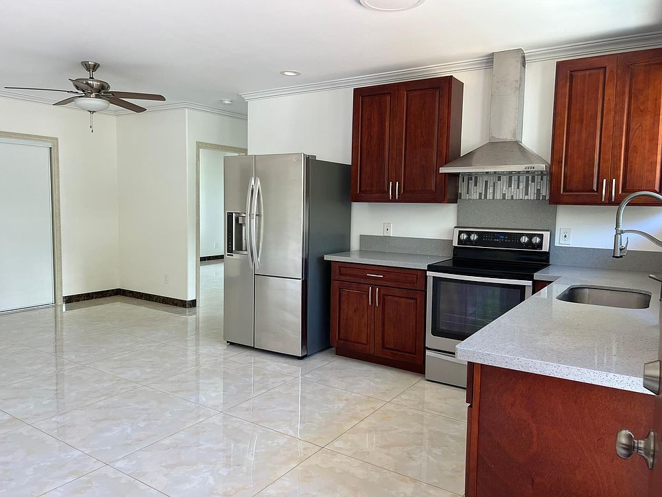Brand new refrigerator. Sink with garbage disposal