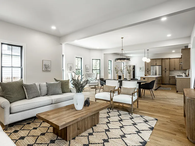 living room looking to dining area and open concept kitchen