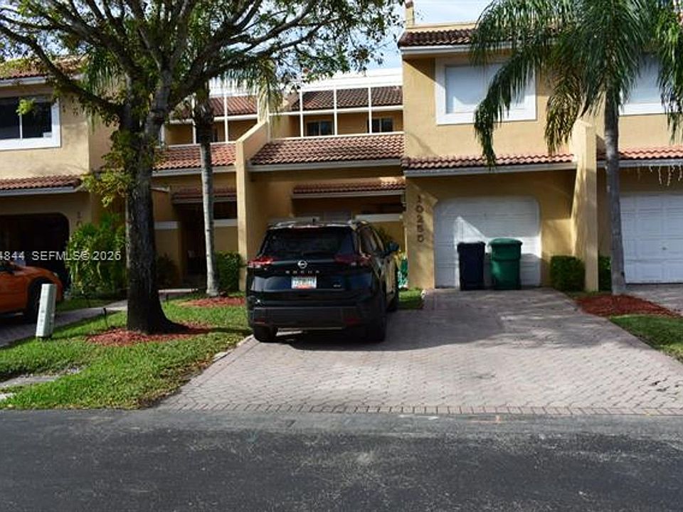 1st image of 10255 NW 51st Ln #Townhouse 10255