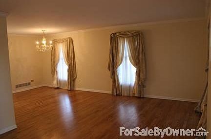 Living Room and Dining Room
						:
						Newly refinished wood floors, with a beautiful chandelier and window treatments.