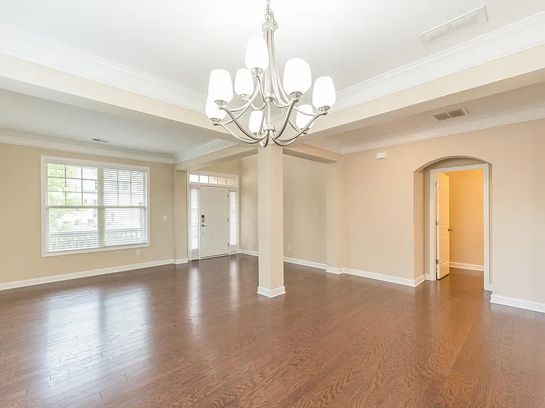 View from entryway/formal dining looking into the main entrance/front door