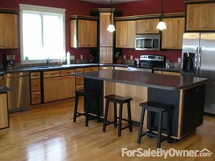Kitchen : Allows tons of storage, stainless steel appliances, and custom cabinets