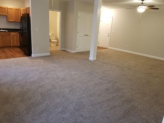 Living room facing kitchen