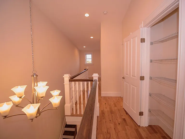 Third floor master suite loft with linen closet