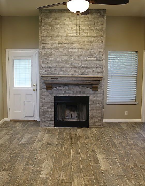 Brick Fireplace with Mantel