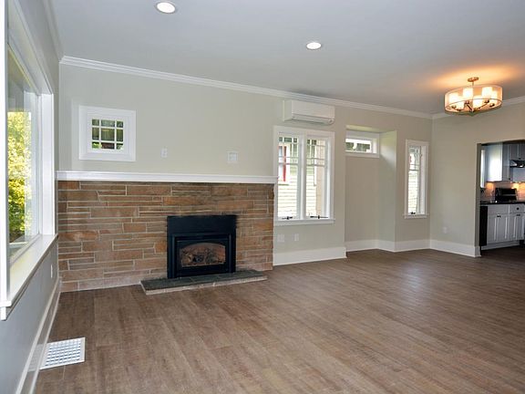 Fireplace for cooler days and air conditioning mini-split unit for those warm ones. Mounting equipment available over fireplace with a plug and internal conduit to hide any wiring.