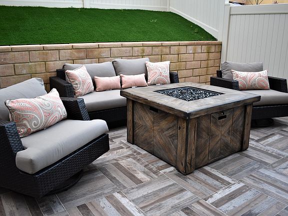 Backyard; furniture not included. Gas hookup available.