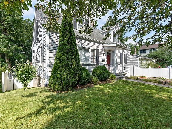 Gates in fence allow you to access the front/back of the house from both sides of the house.