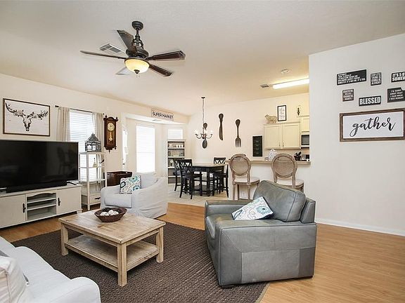 The open concept living room and kitchen makes for a great way to keep the conversation going! Gather the family together in good conversation while preparing a fabulous meal in your lovely kitchen!