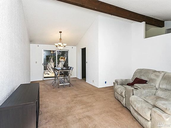 Living Room w/ Vaulted Ceilings
