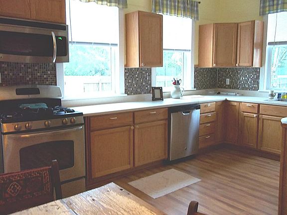 Remodeled Kitchen with stainless appliances and propane stove