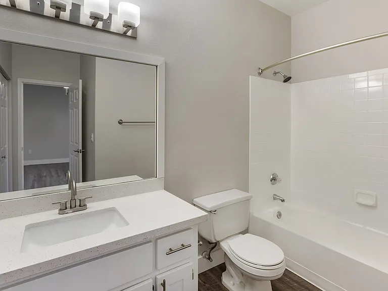Experience luxury with our bathroom boasting a comfortable bathtub for your relaxation
