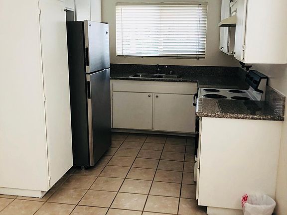 electric stove, dishwasher and new fridge