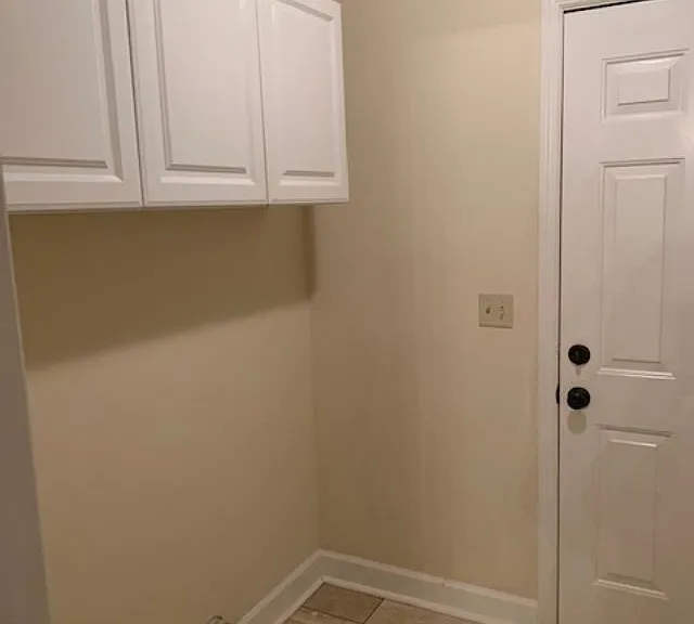 Left side of the Laundry Room ...this door opens into the garage.