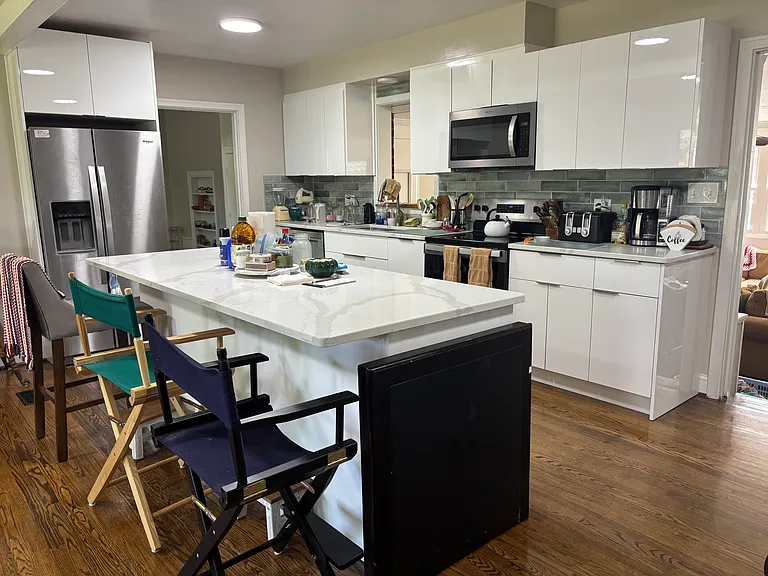 Open kitchen, plenty of pantry and counter space. Appliances are all working, good condition, only a year old