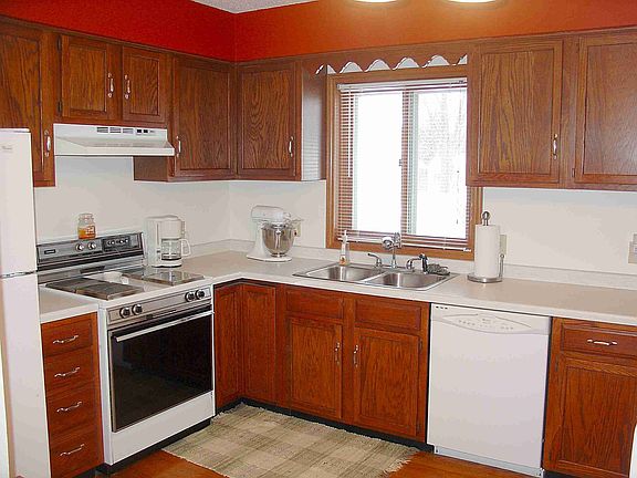 Kitchen offers gleaming hardwood floors.  Updated hardware & fixture.